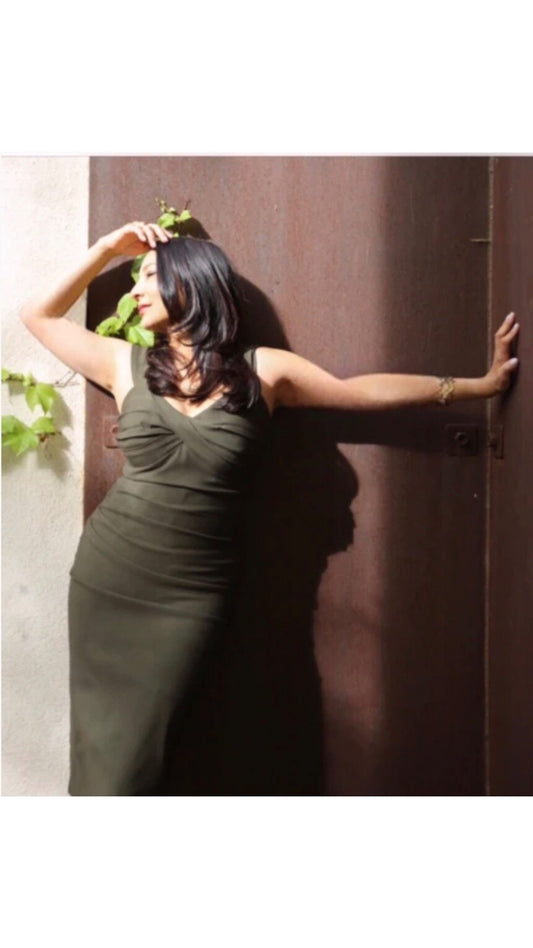 Our Demure Olive Green Midi Dress by Just Add Heels, with a nice stretch that can be worn day into night or anytime at all. Ready to wear anywhere and is Made in Los Angeles. www.justaddheels.com